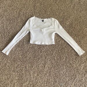Junior’s White Ribbed Long Sleeve Crop Top